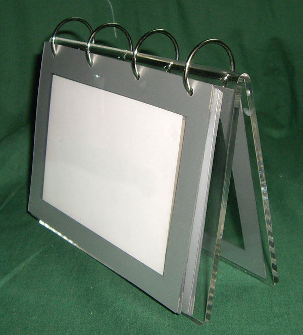 Acrylic calendar stand with six PVC bags